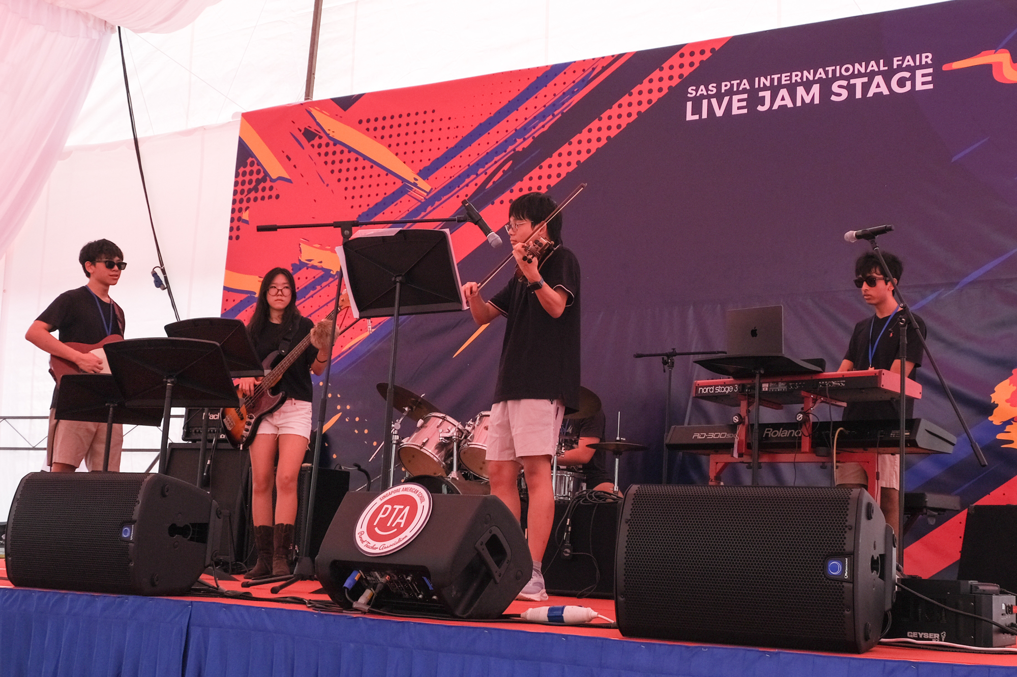 Inversions performing at SAS PTA Live Jam Stage